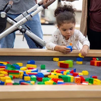 A child playing with educational toys at OMSI